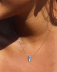 Model wearing 14k golf fill Marquise Necklace