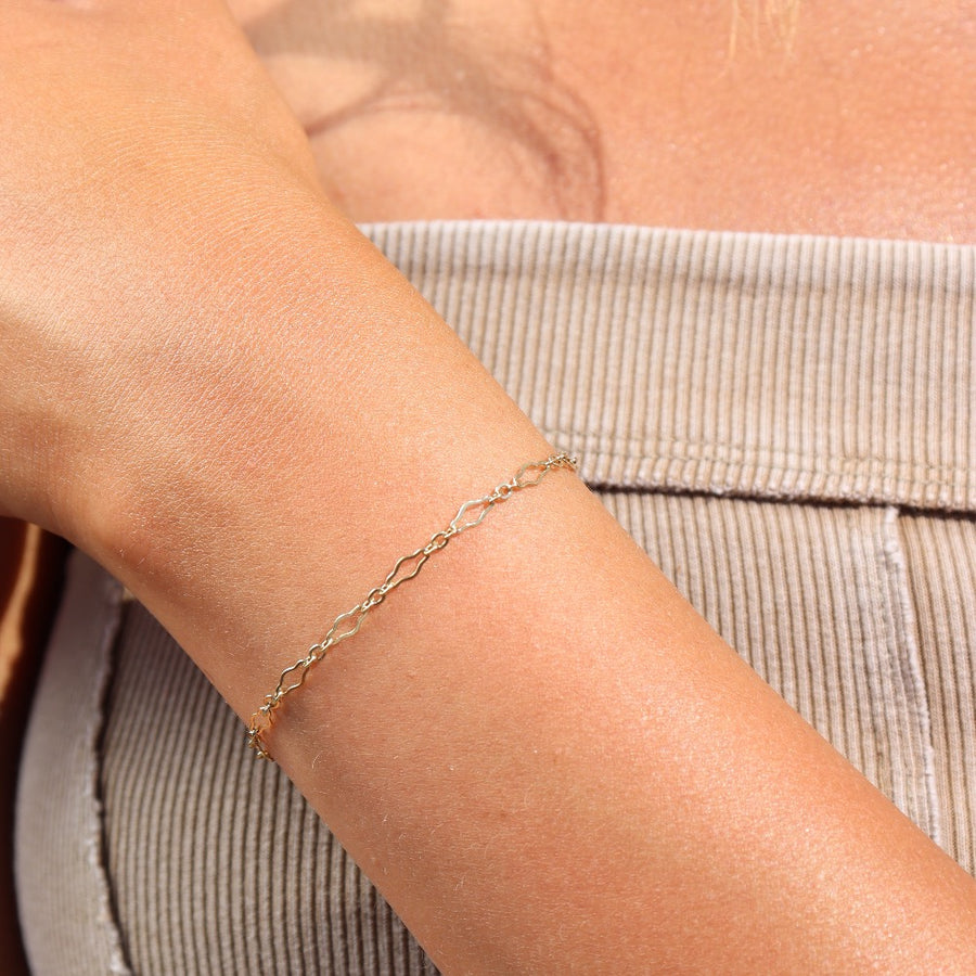 Model wearing 14k gold fill Clara bracelet