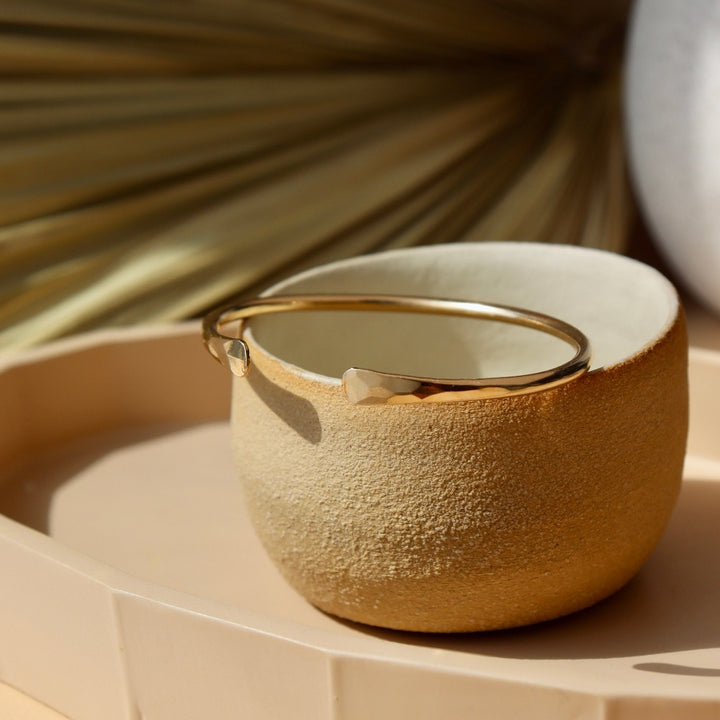 hammered gold cuff bracelet handcrafted by Token Jewelry in Eau Claire, Wisconsin