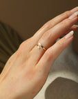 dainty hammered wrap coil ring on model handcrafted by Token Jewelry in Eau Claire, Wisconsin