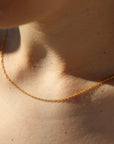 model wearing 14k Gold Filled delicate rope chain 