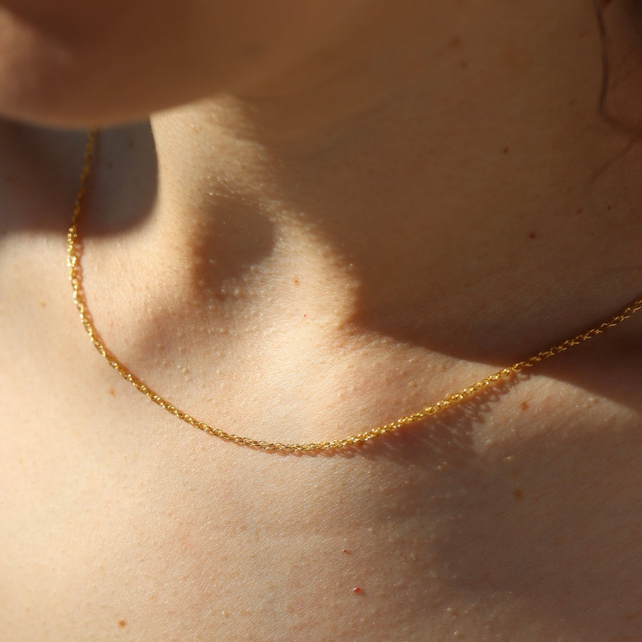 model wearing 14k Gold Filled delicate rope chain 