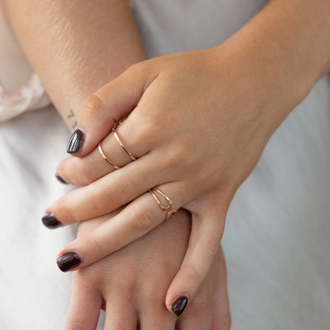 model wearing 14k gold fill sculptural rings 