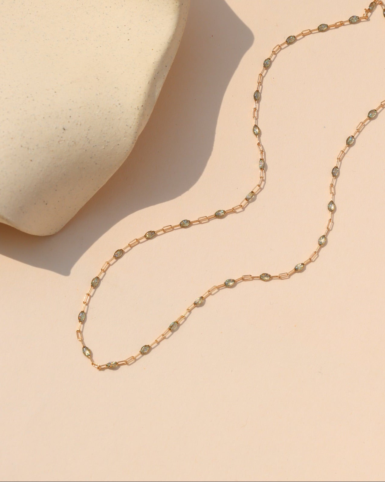 Labradorite Gemlink Choker, a delicate gold-filled gemstone necklace with iridescent labradorite stones, handmade by Token Jewelry.