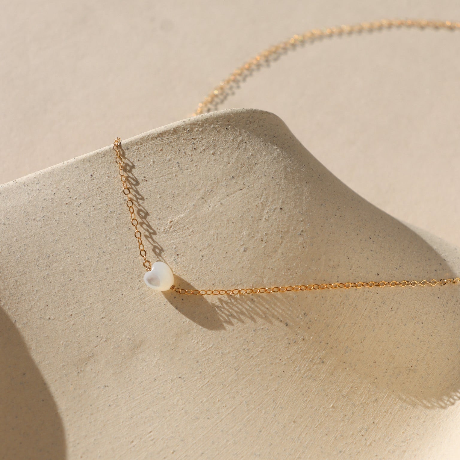 mother of pearl heart bead on simple 14k gold fill chain