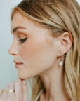 Model wearing 14k gold fill Moonstone Studs - Token Jewelry - eau claire jewelry store - jewelry store near me - 14k gold fill jewelry - sterling silver jewelry - gemstone earrings - womens jewelry style - minimalist style jewelry