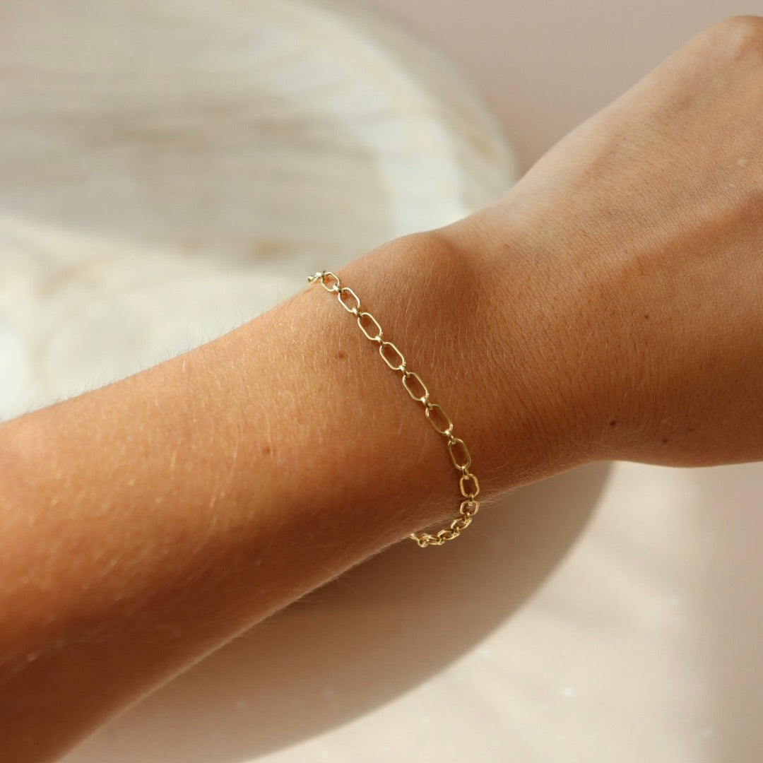 Modern 14k Gold Fill chain Bracelet with oval links and clasp closure. Fashion jewelry handmade by Token Jewelry in Eau Claire, WI