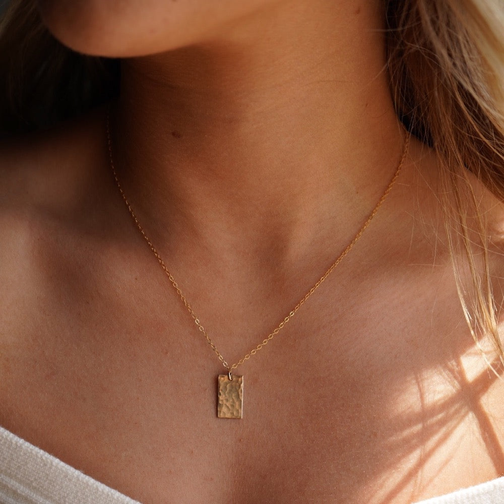 Model wearing 14k gold fill Box charm necklace