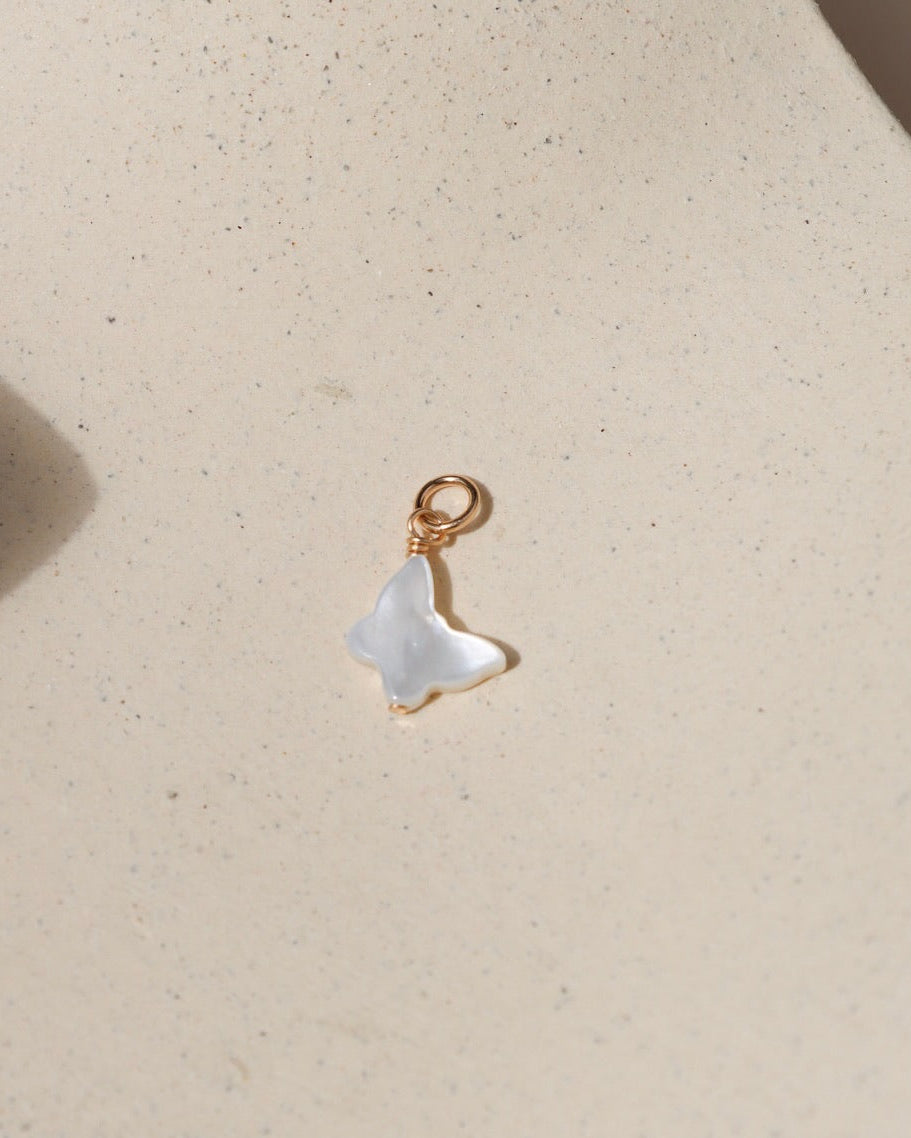 Genuine mother of pearl in a butterfly shape as a charm 