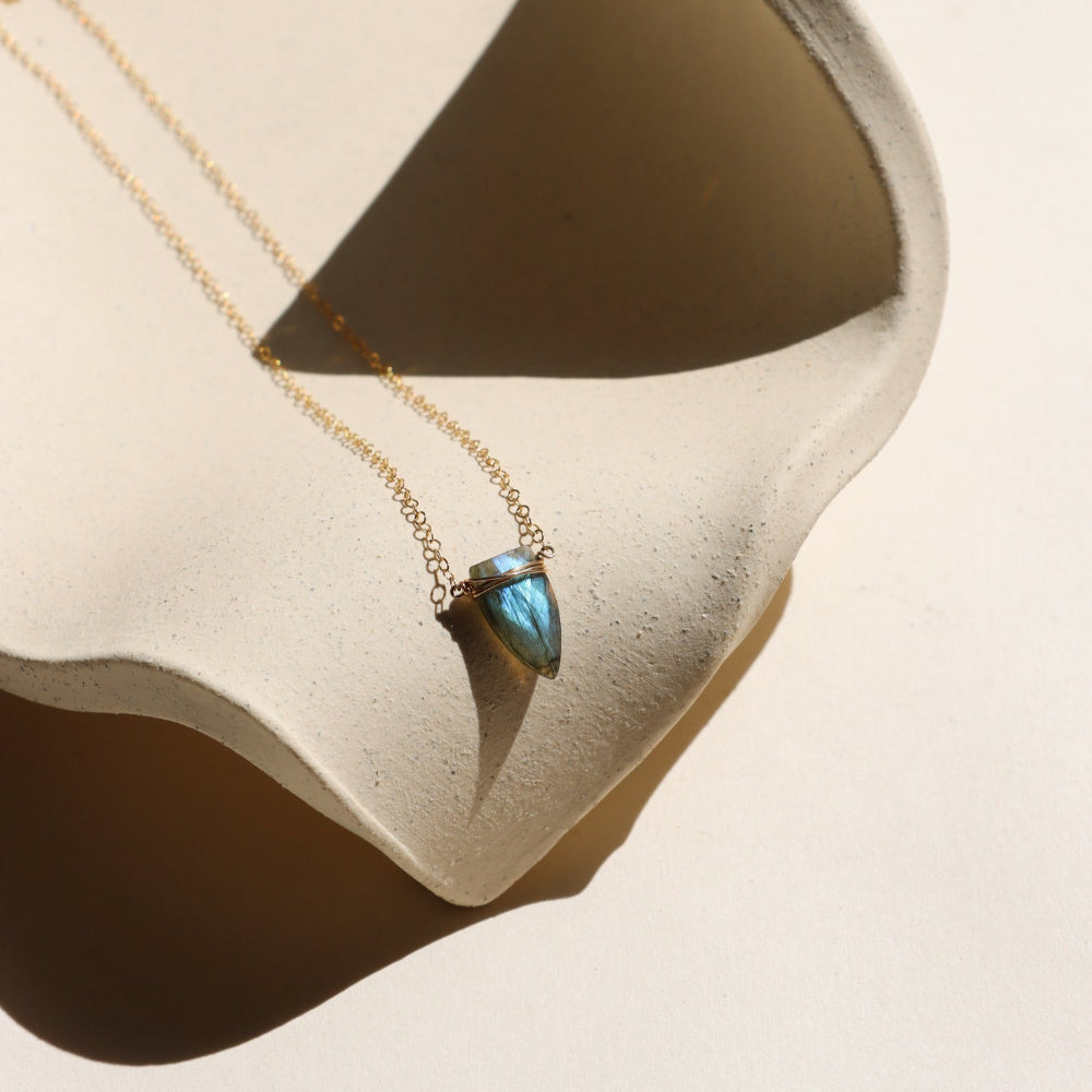 Spear-shaped labradorite pendant on gold chain, handmade anniversary jewelry