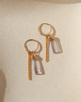 14k gold fill hoop earrings with pink amethyst charms and 14k gold fill chain on a light background