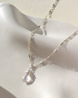 Necklace by Token Jewelry - 925 Sterling Silver Marisol Chain featuring a wire-wrapped rose quartz gemstone