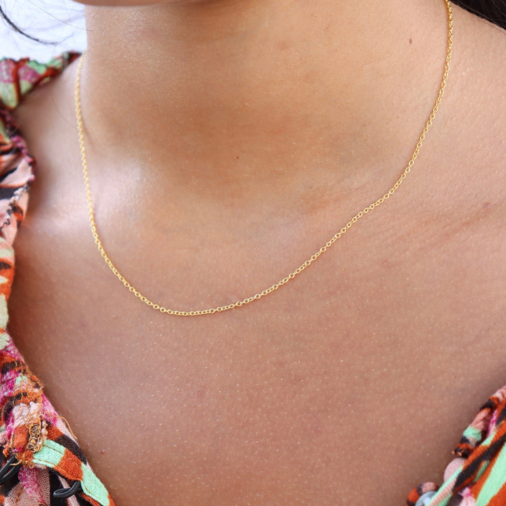 Model wearing a 14k gold fill dainty chain