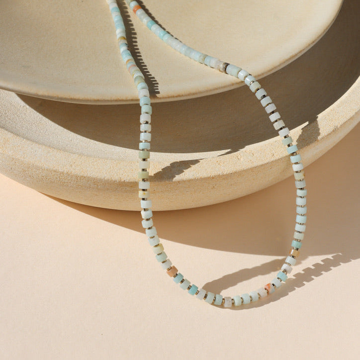 amazonite beaded necklace with 14k gold fill finishing on a light dish