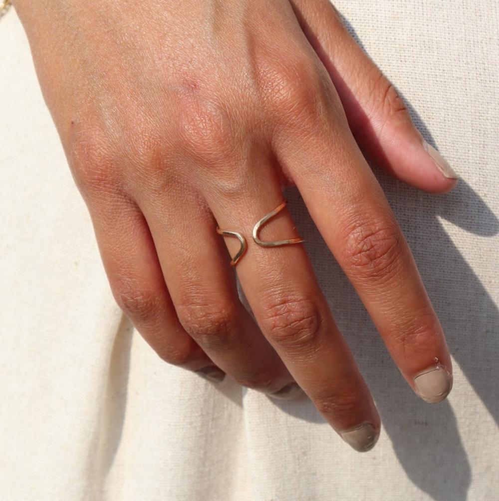Model wearing 14k gold fill hammered ring 