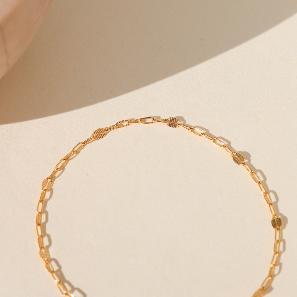 Sunspell Bracelet with softly textured links, available in 14k gold fill or sterling silver. Lightweight and comfortable, perfect for effortless layering and adding a subtle glow to any stack.