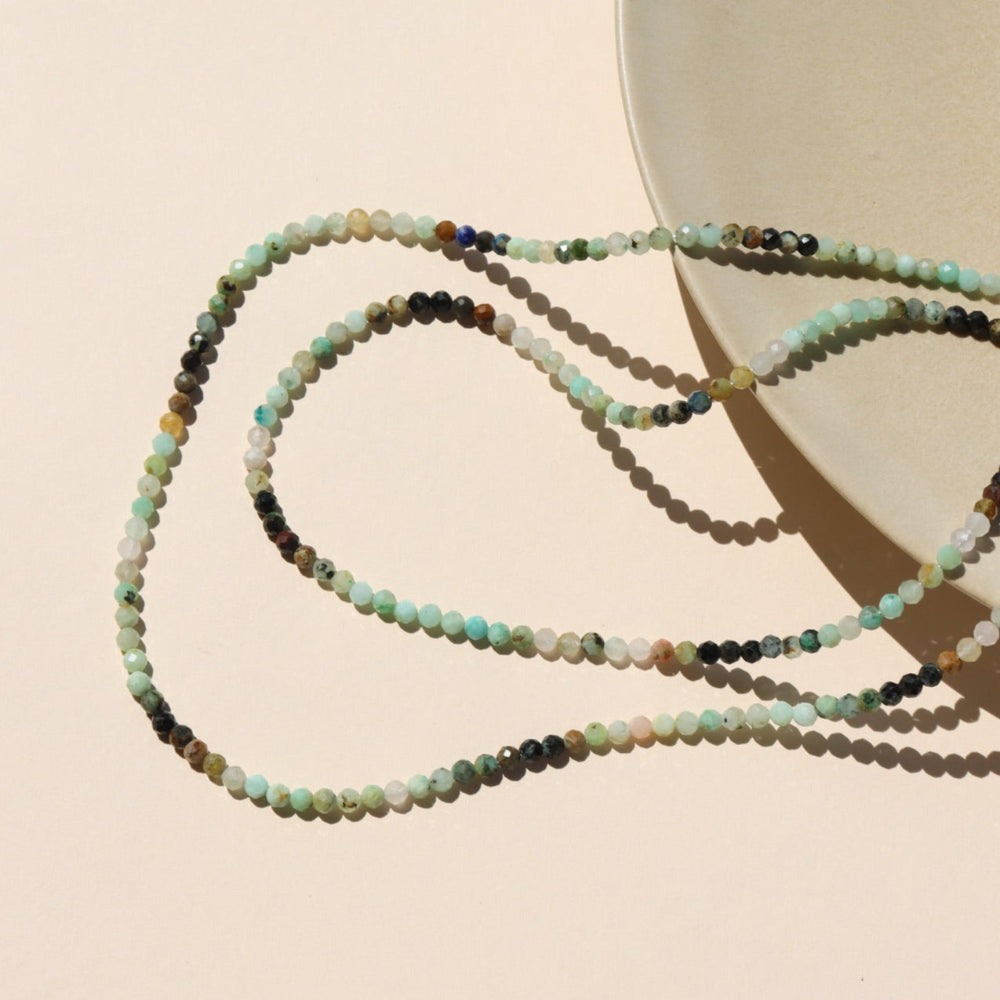 Tidepool Necklace featuring green chrysocolla and blue azurite beads on a delicate chain