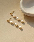 Trillium Pearl Earrings by Token Jewelry product photo