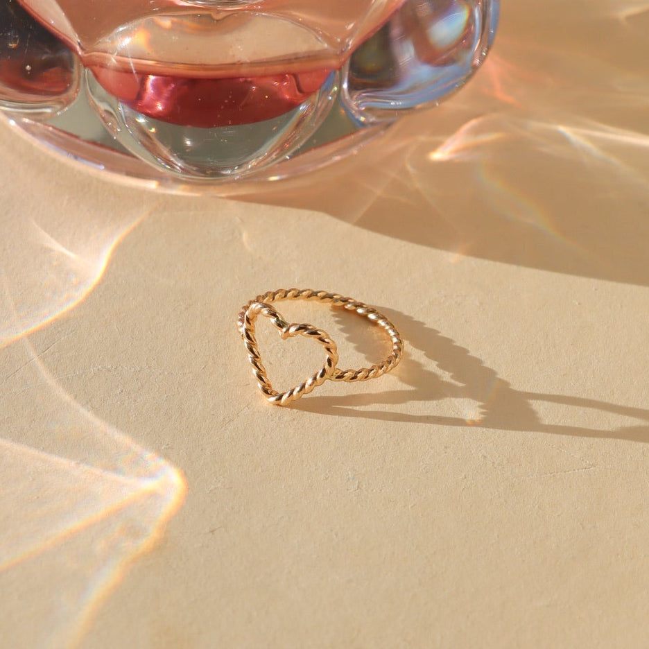 14k gold fill heart ring made with spiral wire in the sunlight