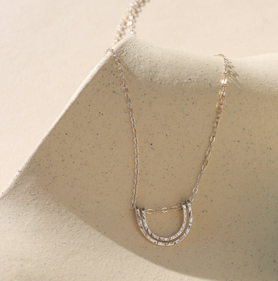 sterling silver hammered pendant on a delicate sterling silver chain necklace