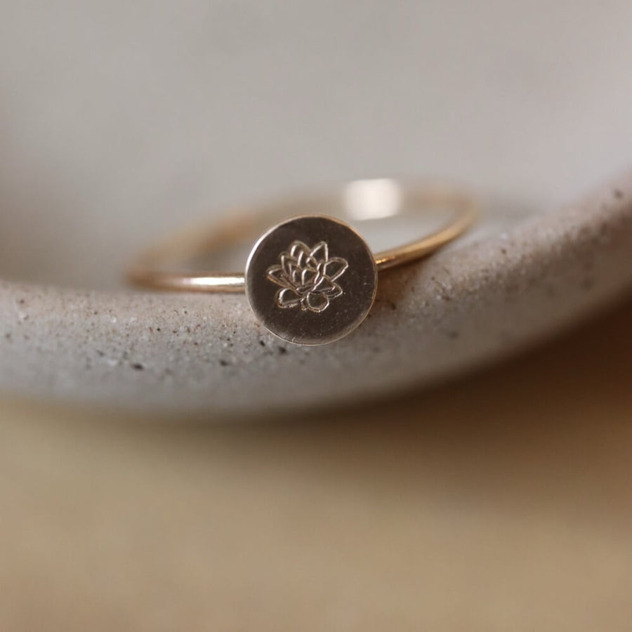 Birth flower ring featuring a Lotus flower for the month of August. Mother's Day Gifts, Personalized Jewelry, Handmade Jewelry, Gold Ring that's flower stamped by Token Jewelry in Eau Claire, WI