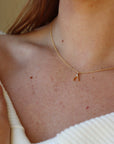 Model wearing 14k gold fill Wishbone Necklace.