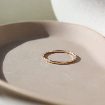 lightly hammered gold stacking ring, handmade by Token Jewelry in Eau Claire, Wisconsin