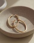 14k gold fill flat oval hoop with snap closure, local Eau Claire, WI studio, Token Jewelry