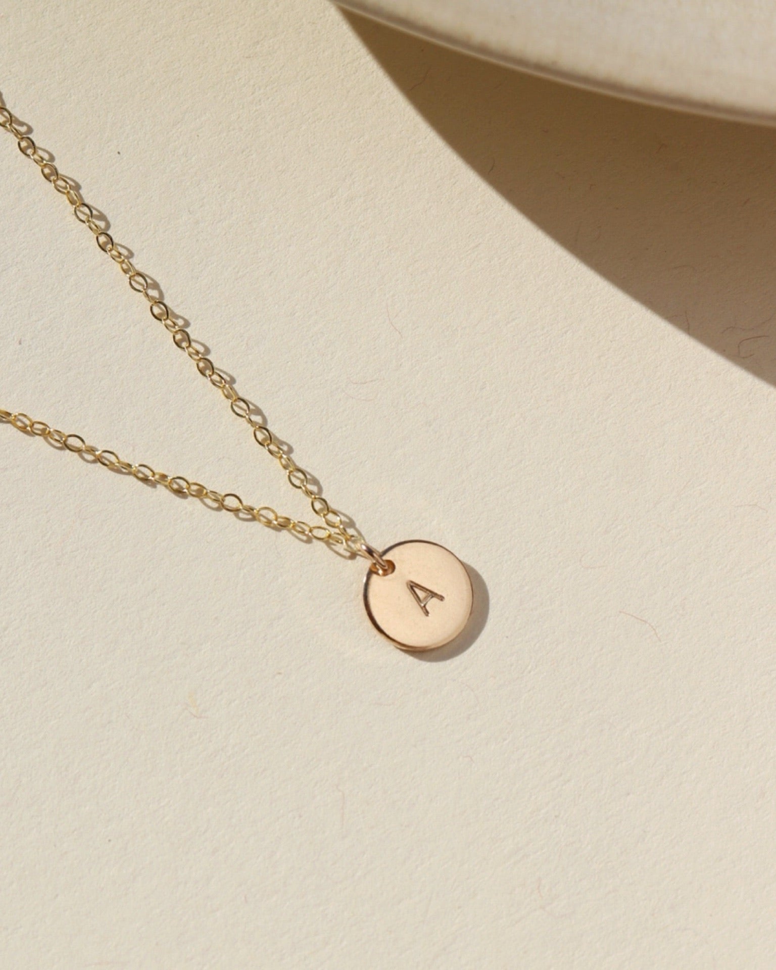 14k gold fill dainty chain necklace with hand stamped small disk charm